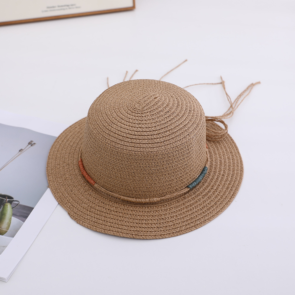 Versión coreana del nuevo sombrero femenino primavera y verano gran ala sombrero para el sol sombrero para el sol de vacaciones protector solar al aire libre sombrero de paja ajustable al por mayor