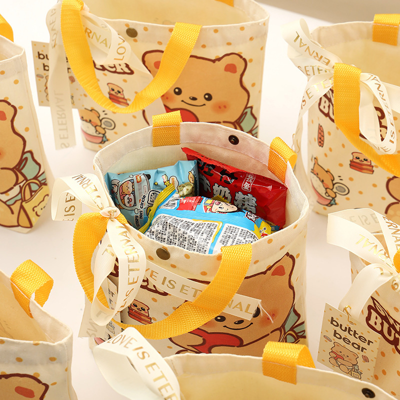 キャンバスバッグお土産イエローベアかわいい手持ちキャンバスバッグ満月宴会1歳誕生日ギフトバター漫画バッグ|undefined