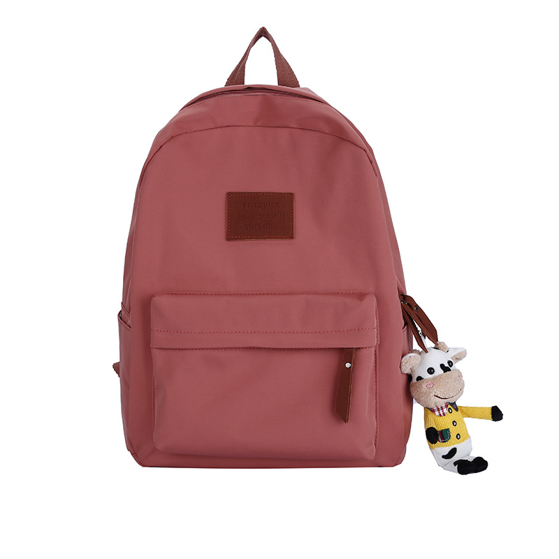 2024 新しいシンプルなバックパックナイロン韓国語バージョン中高生通学日本のキャンパススタイルのバックパック卸売