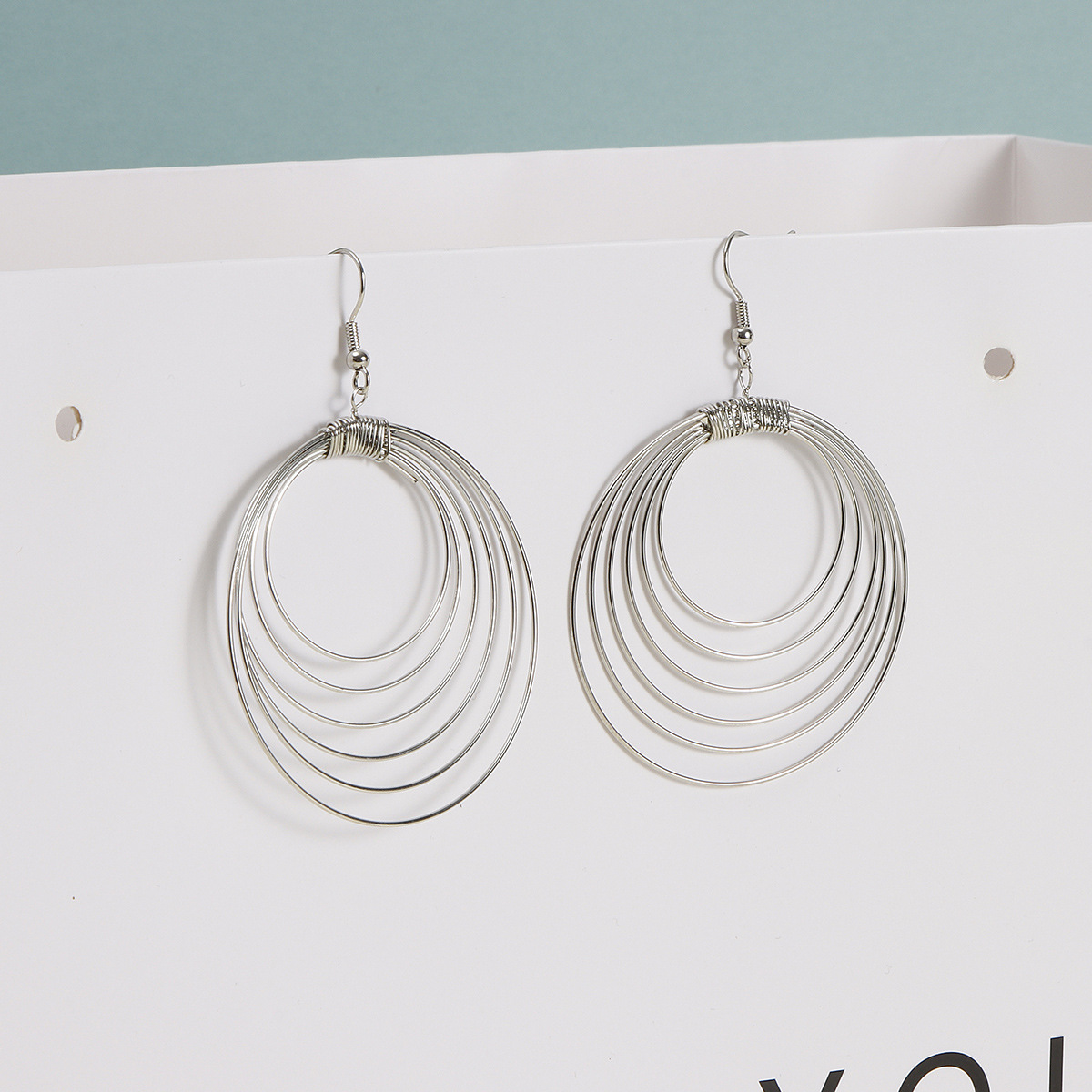 Metal simple hollowed-out round earrings, popular European and American export earrings, earrings and ear hooks wholesale and consignment pic 1