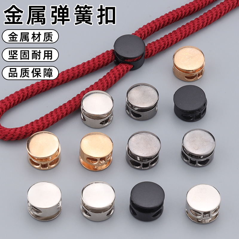 Wholesale double hole metal spring buckle sweater drawstring hanging clock non-slip buckle hat trouser adjustment elastic drawstring buckle