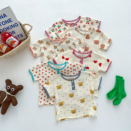 Korean style children's clothing for boys and girls, cartoon printed short-sleeved shorts set, baby summer thin home clothes two-piece set