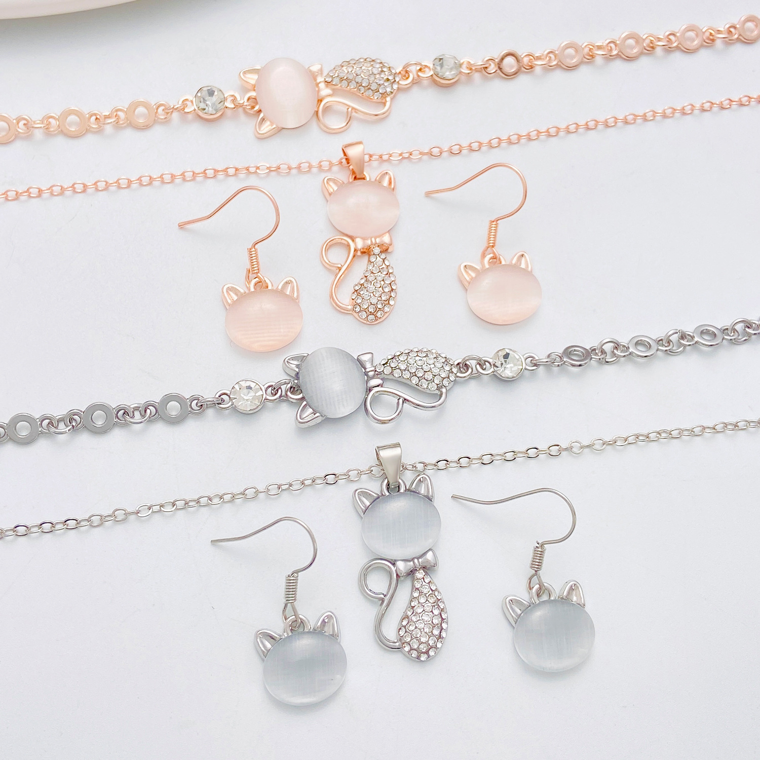 Diseño de moda transfronterizo exquisito ópalo pulsera de gato collar aretes accesorios de vestir accesorios de tres piezas al por mayor