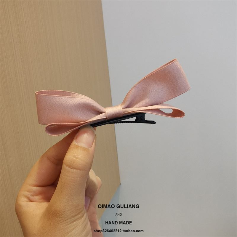 かわいい蝶結びの立体的なヘアピンの少女ピンクの前髪クリップの小さい耳の頭飾りの赤い本はトップクリップを推薦します。|undefined