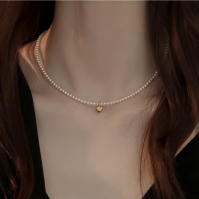 Chloe Zhao's favorite Choker: Freshwater Baby Pearl & Mini Gold Bean Design, Retro Minimalist 14K Gold-Plated Women's Necklace—Exact Replica
