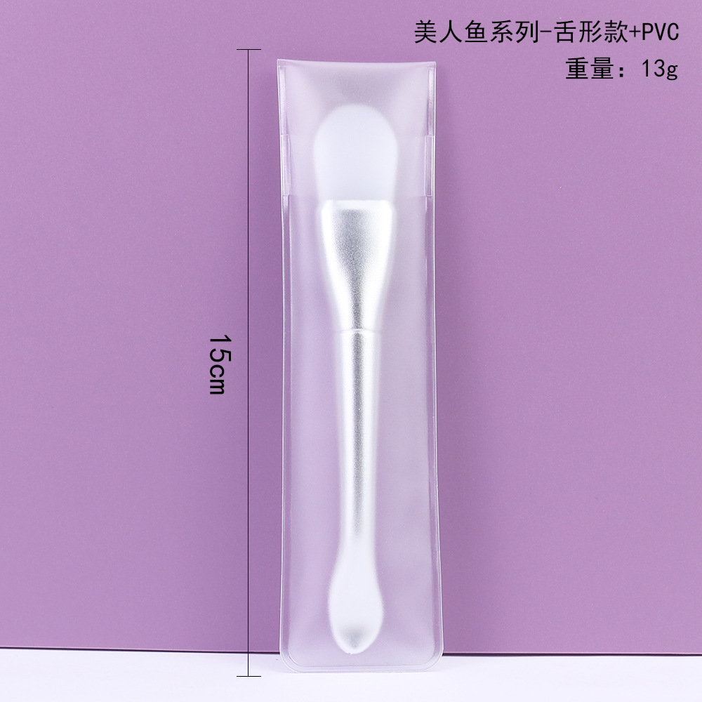 Cepillo de mascarilla de silicona en forma de lengua de cola de pez de una pieza plateada paquete de PVC