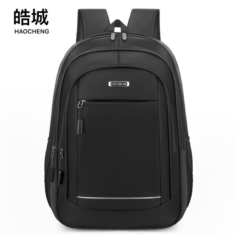 Mochila de computadora de negocios de gran capacidad nueva transfronteriza, mochila de viaje al aire libre de ocio, mochila escolar de reducción de carga para estudiantes de secundaria
