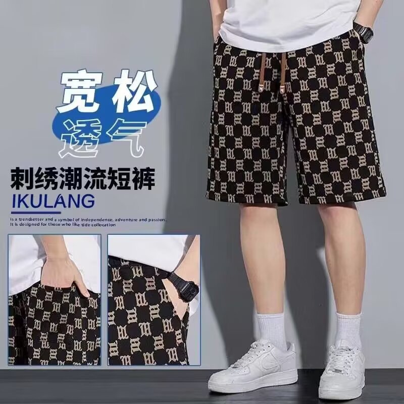 Camisas de ropa de seda de hielo delgada pantalones cortos casuales sueltos de verano estilo de Hong Kong pantalones de playa de hombre de moda pantalones casuales