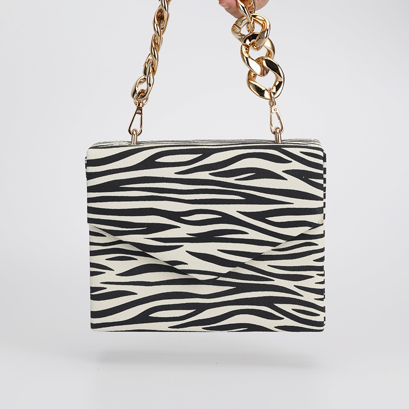Nuevo patrón de cebra noche bolsa de banquete axilas pu moda todo fósforo de las mujeres hombro portátil crossbody bolsa de cadena para las mujeres