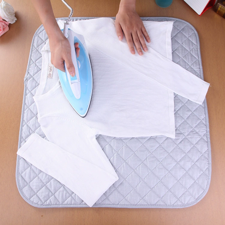 Portable foldable ironing pad, cotton-coated silver backing, replaces ironing board, multiple sizes