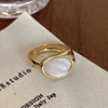 Retro fashionable ring, silver 925 sample, on index finger