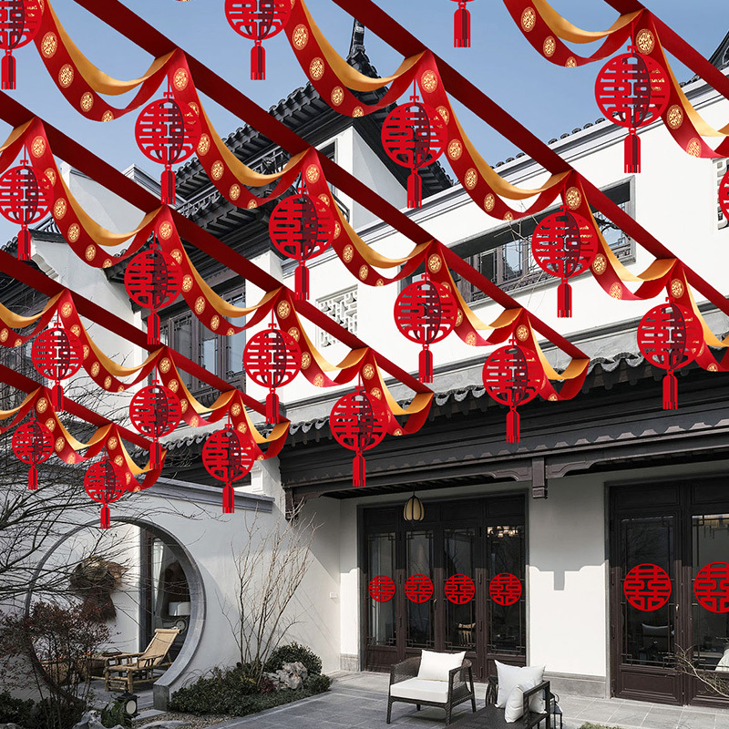 Marriage colorful ribbons and flowers decorate rural courtyard wedding scene, color strips and flags scene layout, wedding planning supplies wholesale