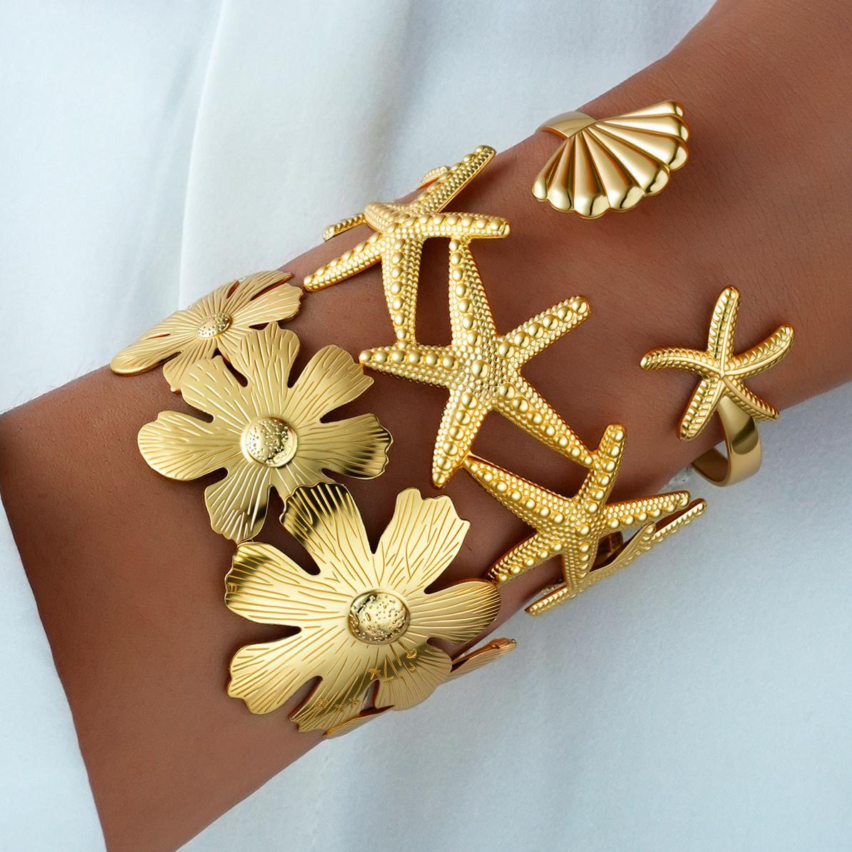 Europa y los Estados Unidos nueva mariposa de acero inoxidable transfronteriza pulsera de flores nichos estrella de mar abierta amplia exagerada joyería al por mayor
