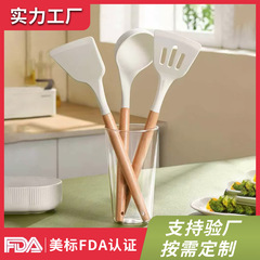 食品級の台所用品の炒め物のシャベルの台所用品のシリカゲルシャベルの耐熱家庭用シャベルの卵焼きの鍋シャベルのスプーンの炒め物