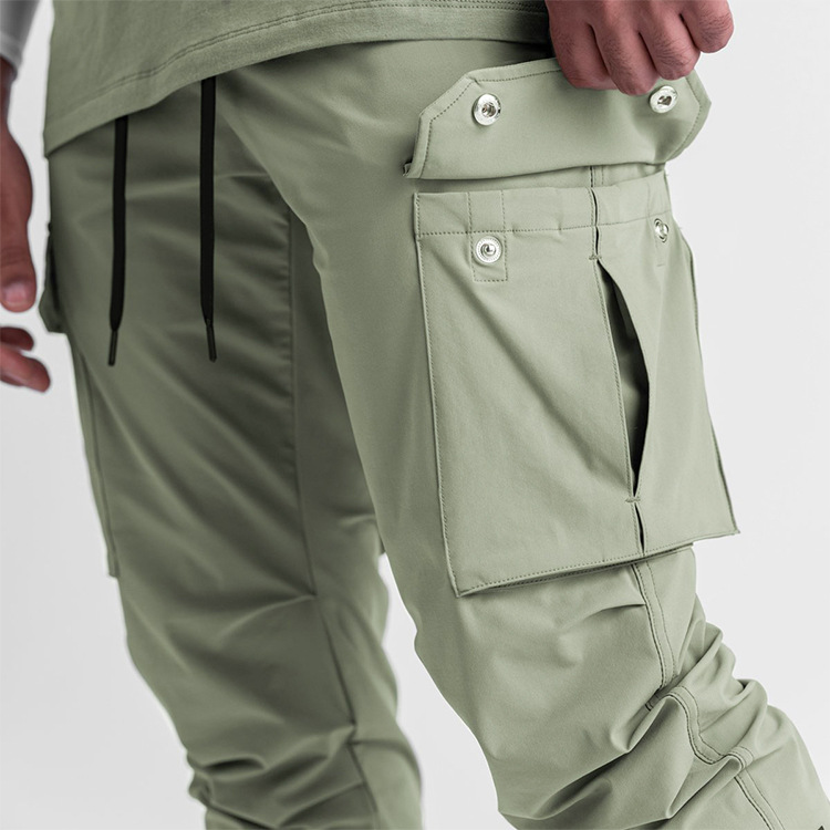 Zomer casual trendy merk multi-bag werk heren lichtbord effen kleur kleine voet mond sneldrogende sportbroek_voghion.com