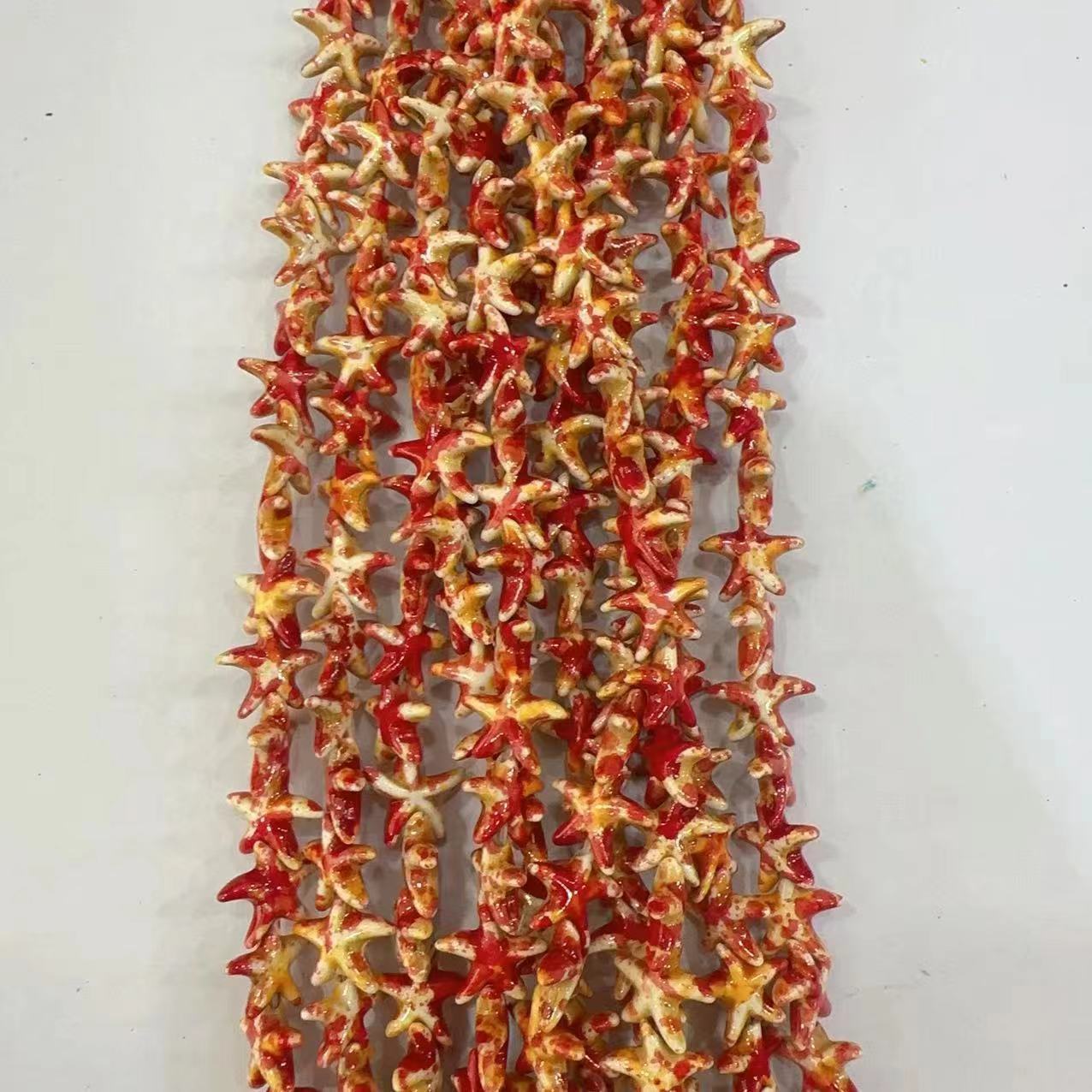 Ventas transfronterizas de coloridas estrellas de mar de piedra de pino cuentas semiacabadas DIY accesorios accesorios materiales de joyería hecha a mano