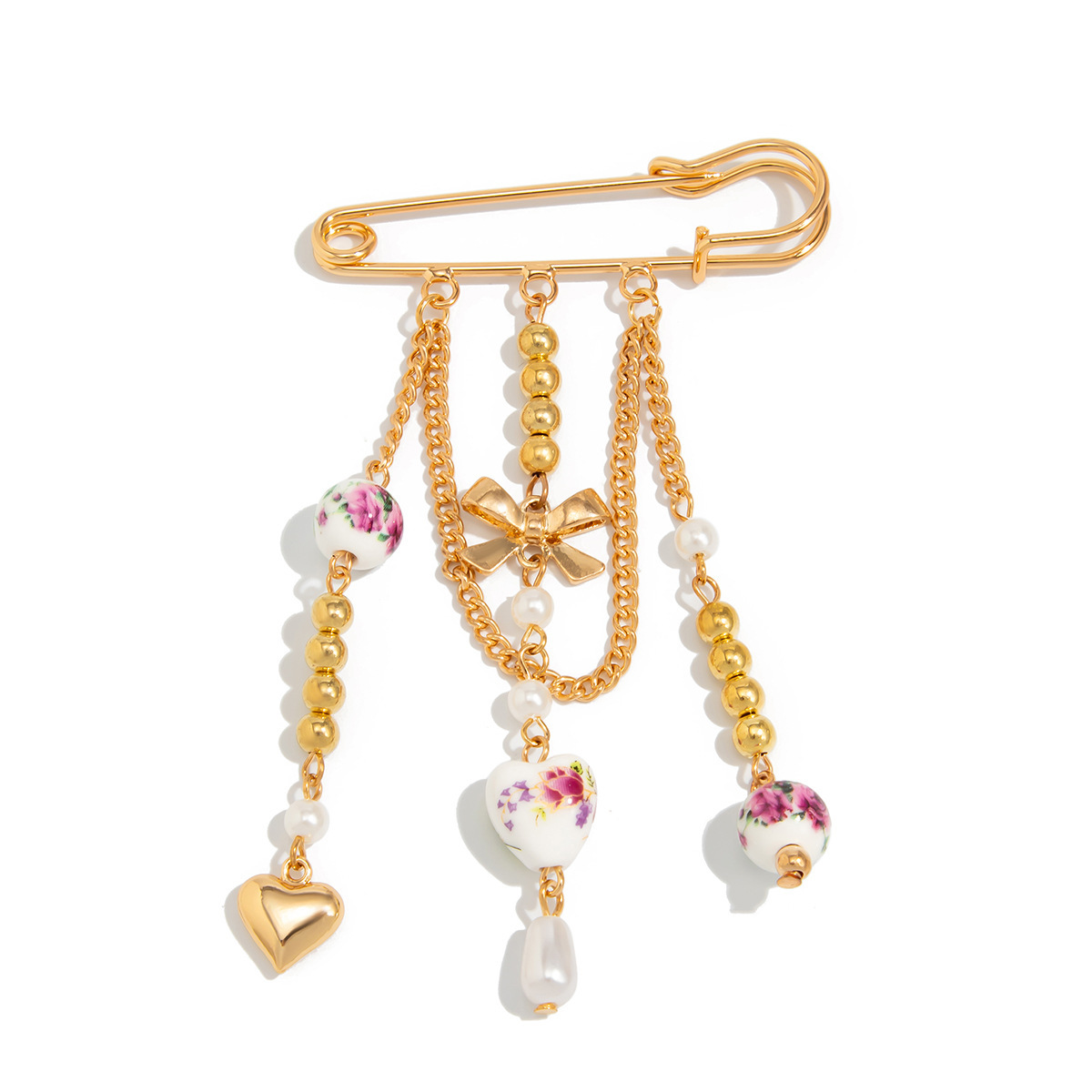 Spilla a forma di fiocco in ceramica con pendente a cuore_voghion.com