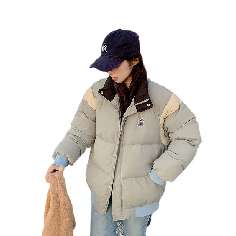 Ropa de béisbol suave coreana de color de invierno para mujeres de nuevo estilo de cuello vertical ropa de pan suelta coreana pequeña chaqueta de algodón suelta