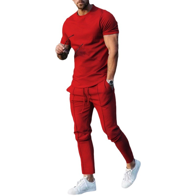 Traje de ropa de hombre cruzado-frontera traje europeo y americano 2023 verano color sólido casual cuello redondo manga corta deportes camiseta pantalones traje de dos piezas hombres