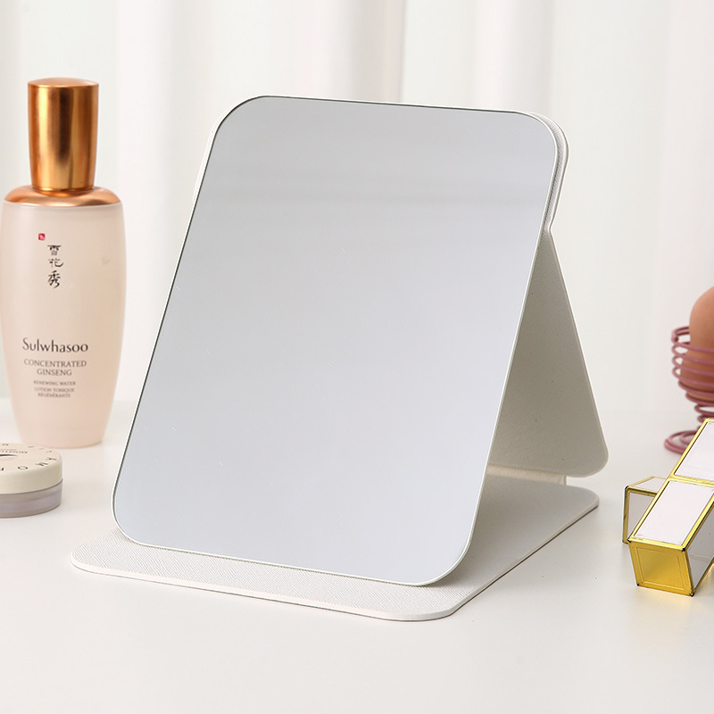 Espejo plegable de cuero PU Dormitorio de estudiantes Espejo de maquillaje de belleza de estilo princesa Espejo de tocador simple de escritorio para el hogar
