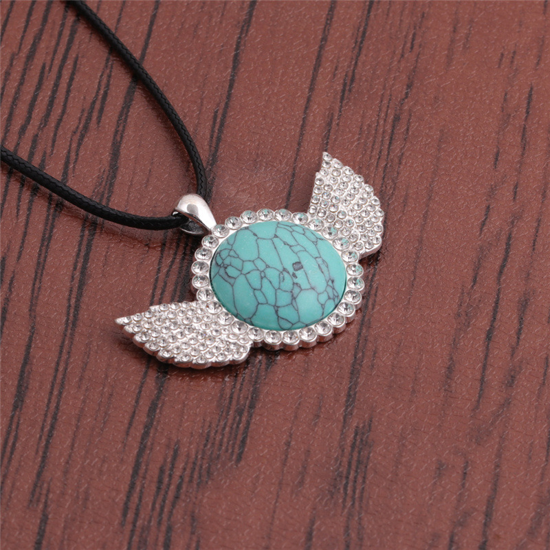 Collier Avec Ailes En Acier Inoxydable Turquoise Et Diamant display picture 8