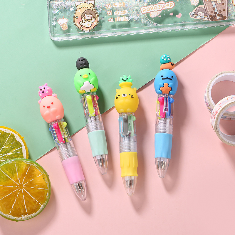 Fabricante mayorista de cuatro colores bolígrafo de silicona bolígrafo multicolor de dibujos animados cabeza portátil de estudiantes