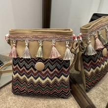 民族风女包2025新款女士单肩斜挎包时尚潮流苏波浪花纹水桶包