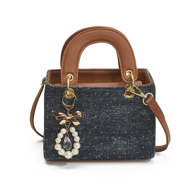 Diseño de nicho color en contraste bolso cuadrado pequeño portátil femenino 2025 nuevo bolso diagonal de diamantes retro de alta gama de moda