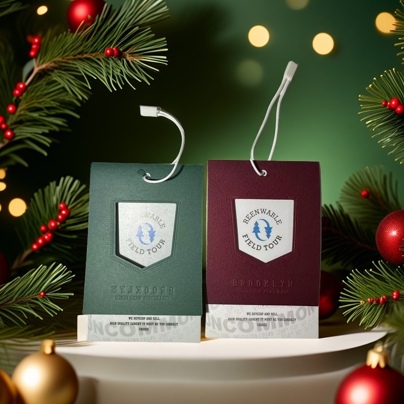 吊牌定 做烫金墨绿卡凹凸服装店女装标签订 制印刷衣服挂牌商标设