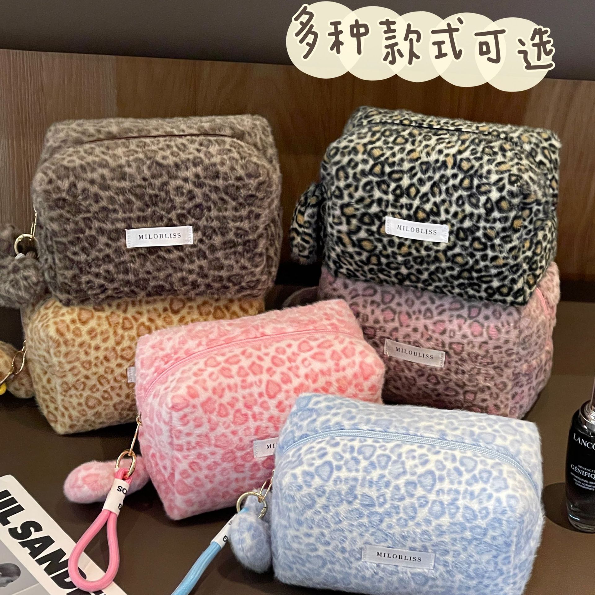Nueva bolsa de maquillaje impresa de leopardo de peluche de pelo de conejo multifuncional portátil otoño y invierno para salir bolsa de almacenamiento de lavado de gran capacidad
