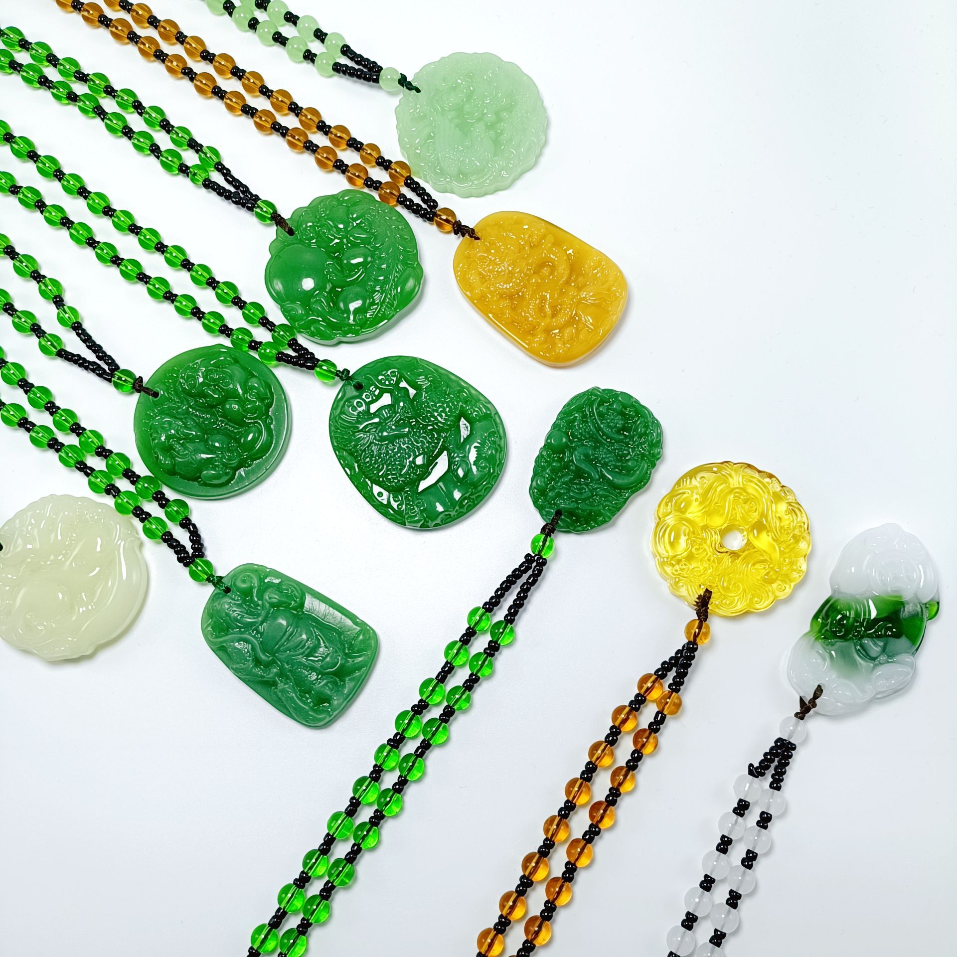 Versatile ethnic style imitation jade dragon and phoenix pendant, Pixiu and Qilin long sweater chain, hot-selling item at street stalls, wholesale from the manufacturer.