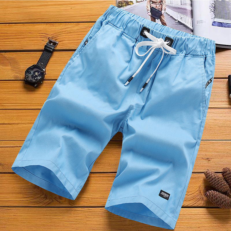 Pantalones de playa casuales para hombres, pantalones cortos de verano de cinco puntos, pantalones largos y sueltos para hombres, fábrica de siete puntos.