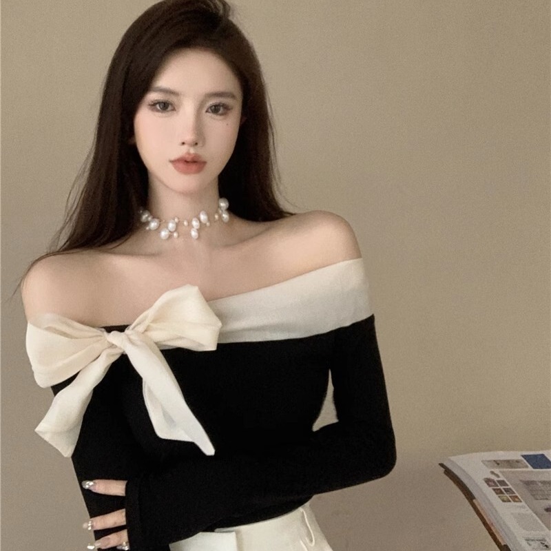 Sexy off-shoulder sweater women's high-grade Hong Kong style light mature style western style hot girl scheming bow T-shirt top Sexy off-shoulder sweater women's high-grade Hong Kong style light mature style western style hot girl scheming bow T-shirt top