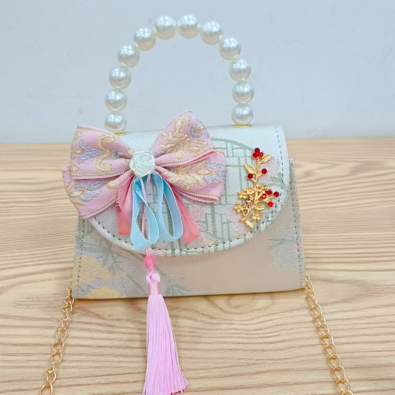 Niños pequeños bolsos de hombro de viento de fragancia de alta calidad exquisita niña antigua bolso de cambio princesa perla bolso de mano