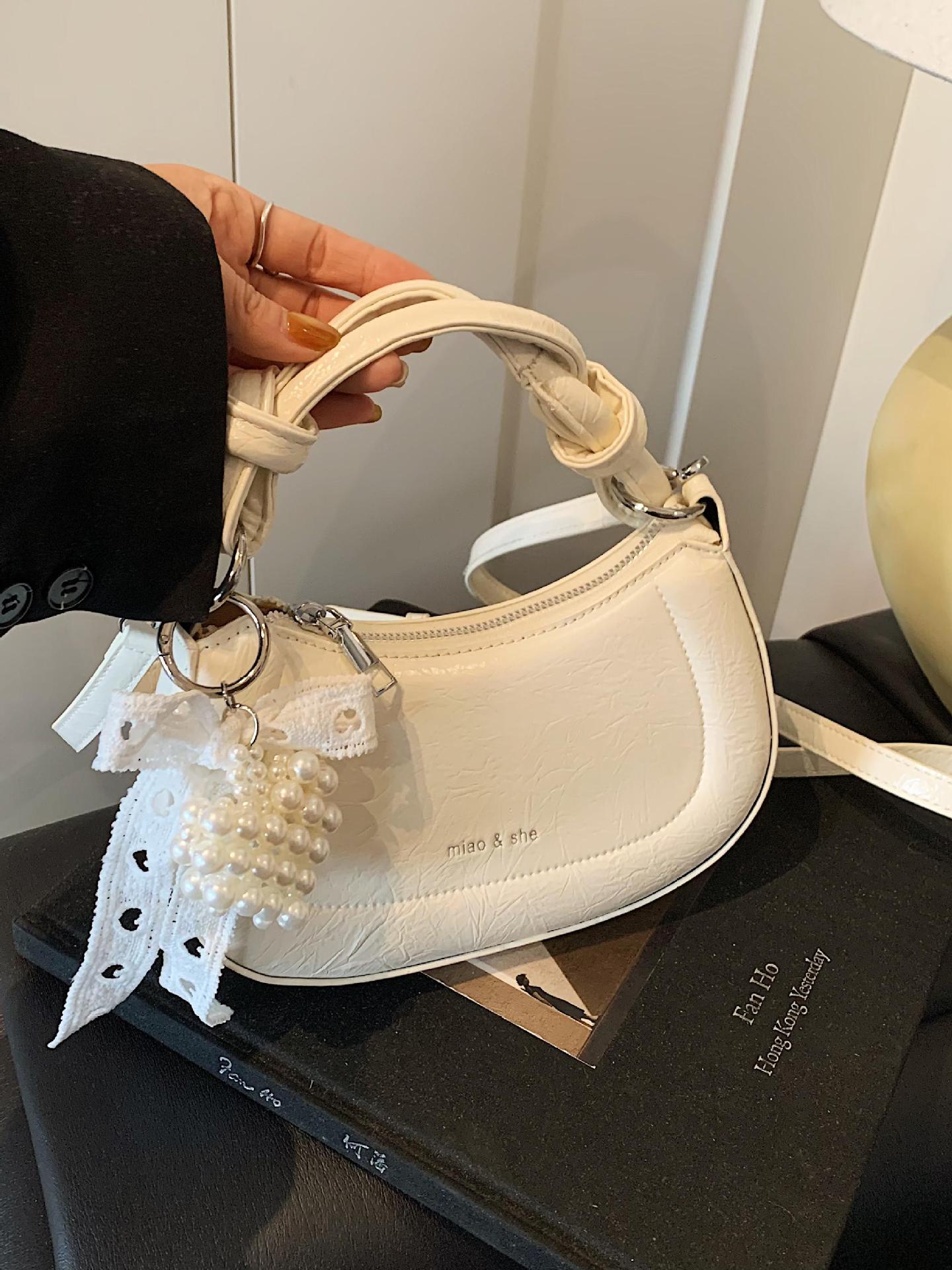 Bolso de nicho francés para mujer 2025 nuevo bolso de hombro casual de todo fósforo de moda bolso de silla de mensajero de estilo occidental