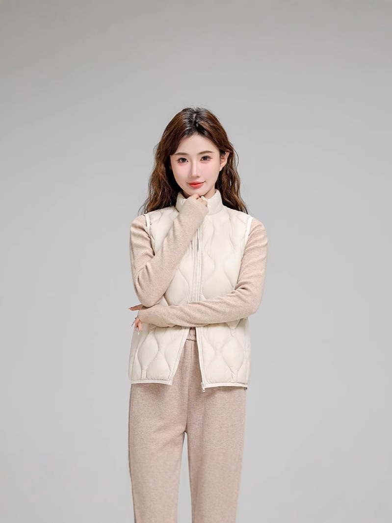 Chaqueta de plumón casual ligera de mujer moda polifacética blanca ligera caliente invierno y otoño abrigo delgado grande