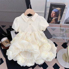 女の子の立体バラの花のワンピースの新型の夏服の子供の蓬蓬のスカートの赤ちゃんの夏のpolo襟の王女のスカート