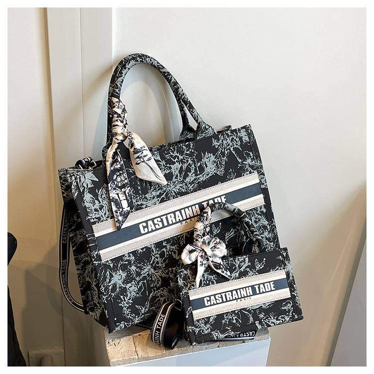 Bolsos de lona transfronterizos bolsos de mujer 2025 nueva moda retro letras impresas bolsos de hombro de gran capacidad