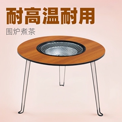 戸外囲炉裏でお茶を作るテーブルのセットはシ博焼き携帯で室内の炭を畳んでお茶を温めるストーブです。