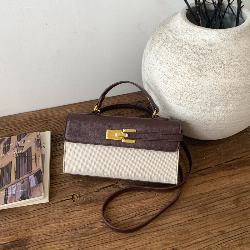 Cross-border retro bolsos europeos y estadounidenses mujeres 2026 nuevo nicho super caliente Kelly bolsa de viaje ocio mochila pequeña