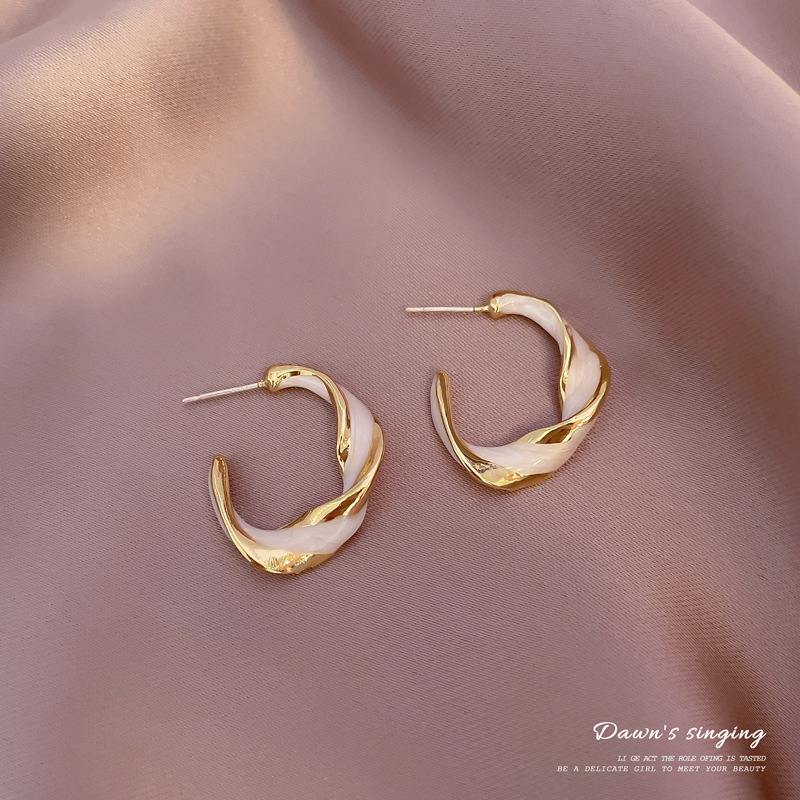 Korean New Retro Earrings Female Simple Personality Twisted Glaze Ring Earrings Wholesale display picture 8