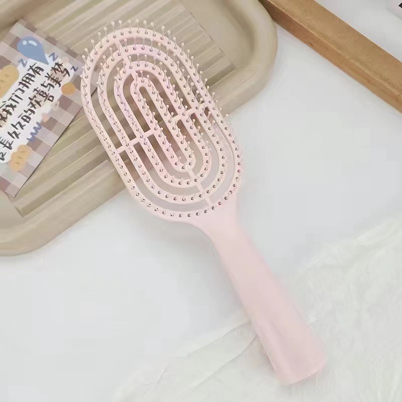 핑크색 갈비 빗