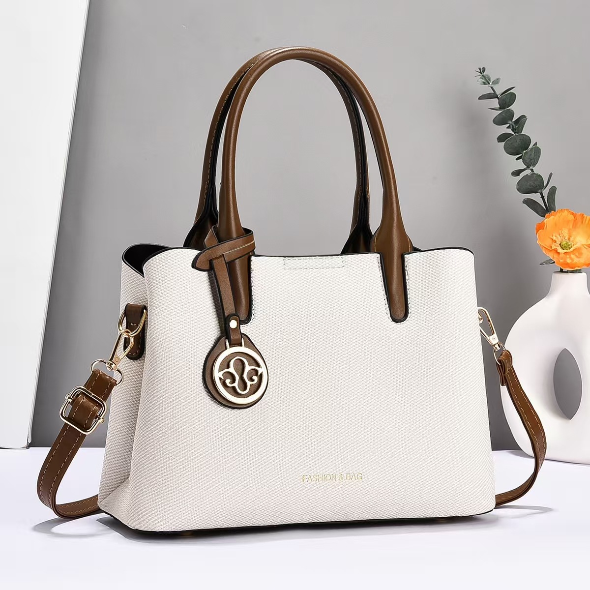 Bolso de mano universal nuevo bolso de hombro de moda bolso de mediana edad bolso de madre bolso de transporte casual bolso de mano