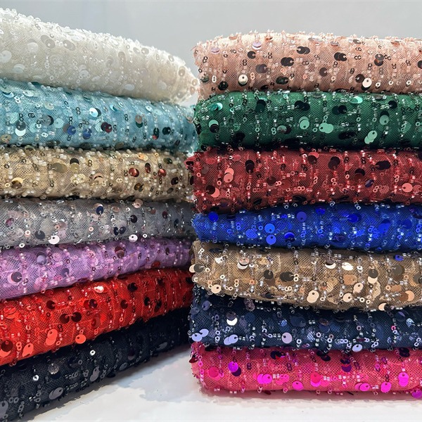 Fábrica al por mayor sequinilla bordada perlas tubo bordado tela de moda rendimiento de escenario ropa de vestir de alta calidad tela