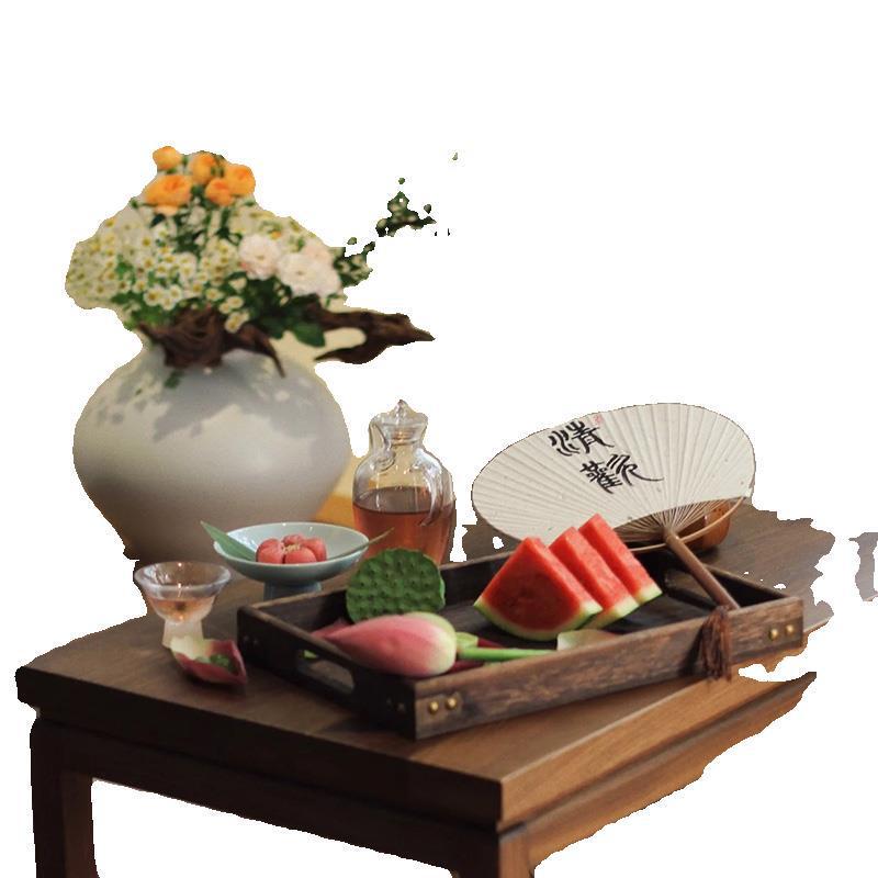 竹の葉のお菓子は中国式の葉のお茶を並べて竹の道具の甘い心のお茶のお菓子の皿の茶屋の茶室を休んでちまきの葉を飾ります。|undefined