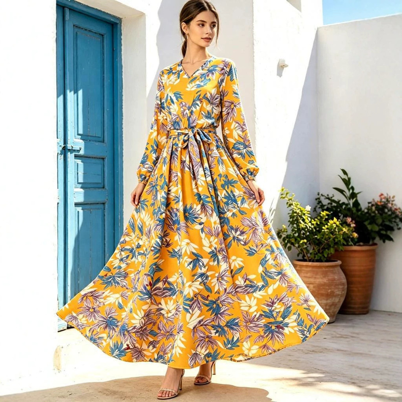 Yellow tropical print V-neck long-sleeve waist-tied long dress with a large hem in resort style, available in stock Yellow tropical print V-neck long-sleeve waist-tied long dress with a large hem in resort style, available in stock