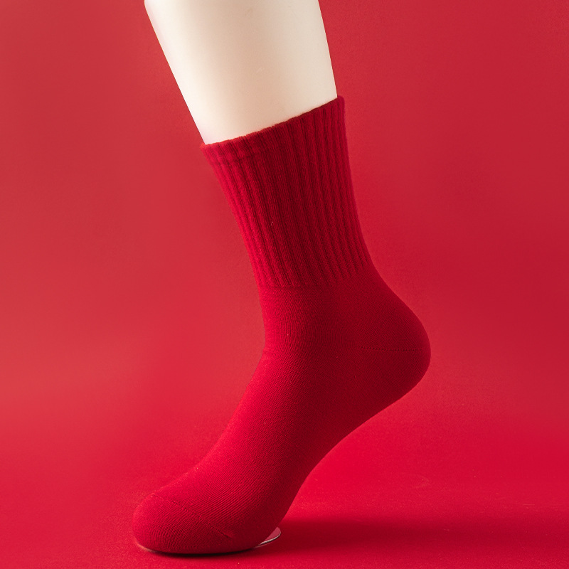 Calcetines rojos de año natal Calcetines de tubo de otoño e invierno para mujer Calcetines rojos grandes de boda de año nuevo Calcetines de pareja de boda al por mayor