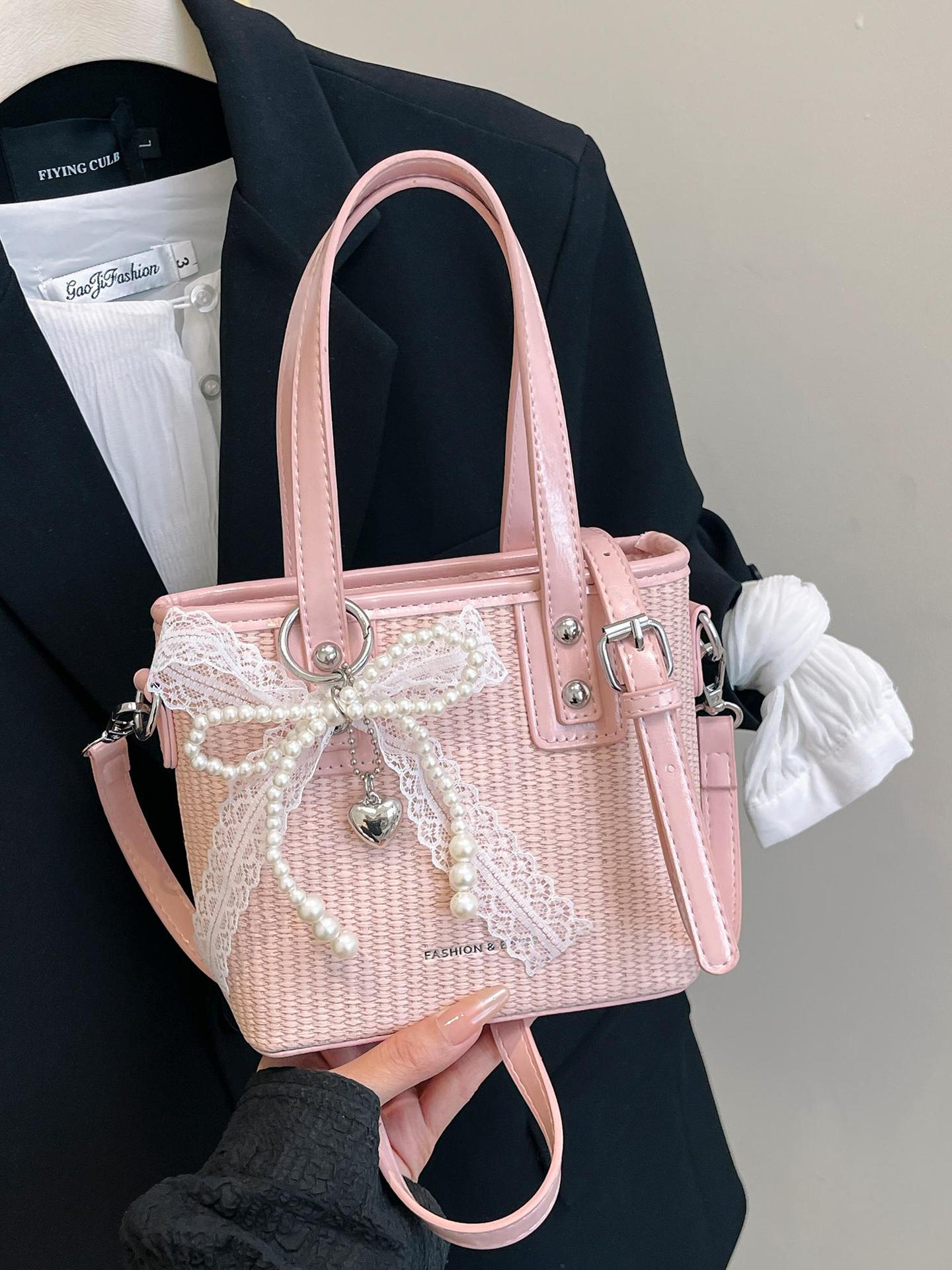 Bolsa de balde de mano caliente de verano para mujeres 2025 nueva bolsa de playa de vacaciones de playa bolsa de tejido bolsa de paja