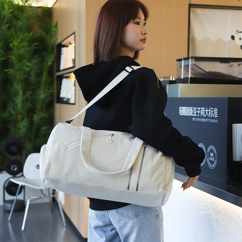 Bolsa de viaje portátil para mujeres, gran capacidad, moda ligera, viaje corto, bolsa de viaje, bolsa de embarque, bolsa de almacenamiento en espera de producción