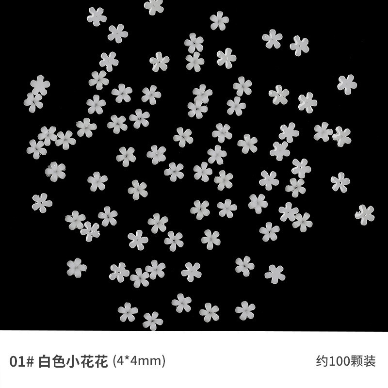 Popular manicura popular en línea pequeña flor blanca tamaño blanco mezclado flor de cinco pétalos con pequeña bola de acero tridimensional decoración de uñas de resina